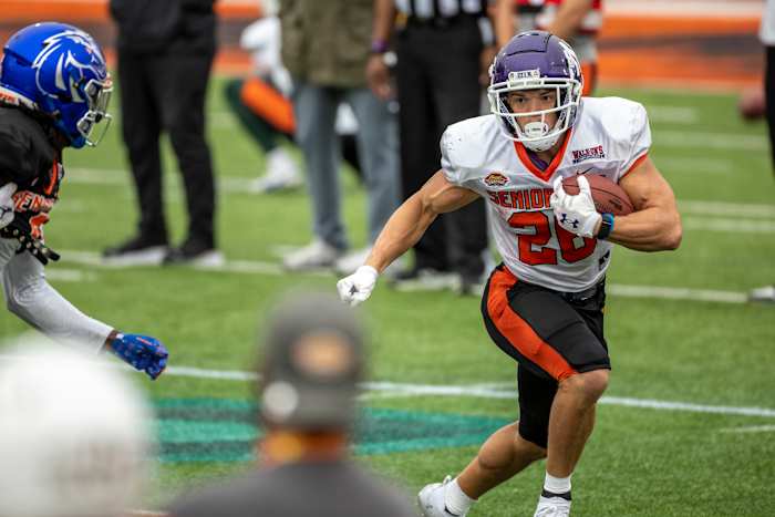 Feb 1, 2023; Mobile, AL, USA; National running back Evan Hull of Northwestern (26) practices during the second day of Senior Bowl week at Hancock Whitney Stadium in Mobile.